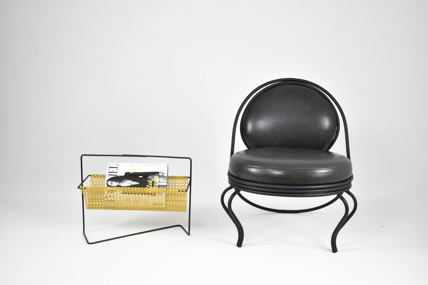 Shop 1950s–60s French Mid-Century Modern Magazine Rack in Perforated Metal - Spirit Gallery Vintage Furniture