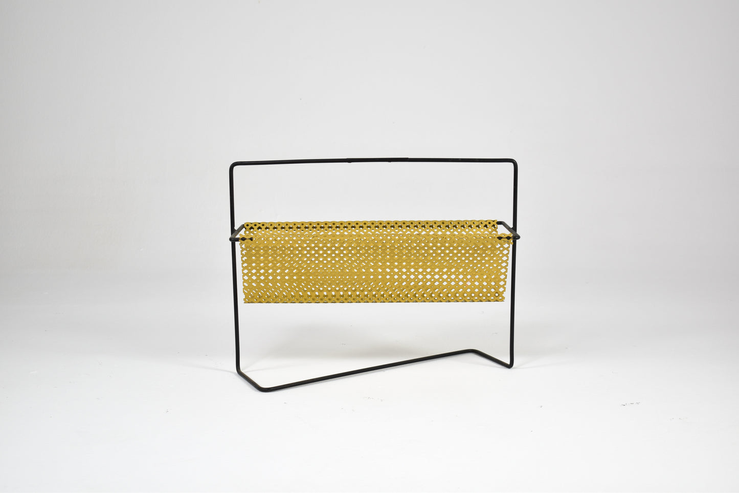 Shop 1950s–60s French Mid-Century Modern Magazine Rack in Perforated Metal - Spirit Gallery Vintage Furniture