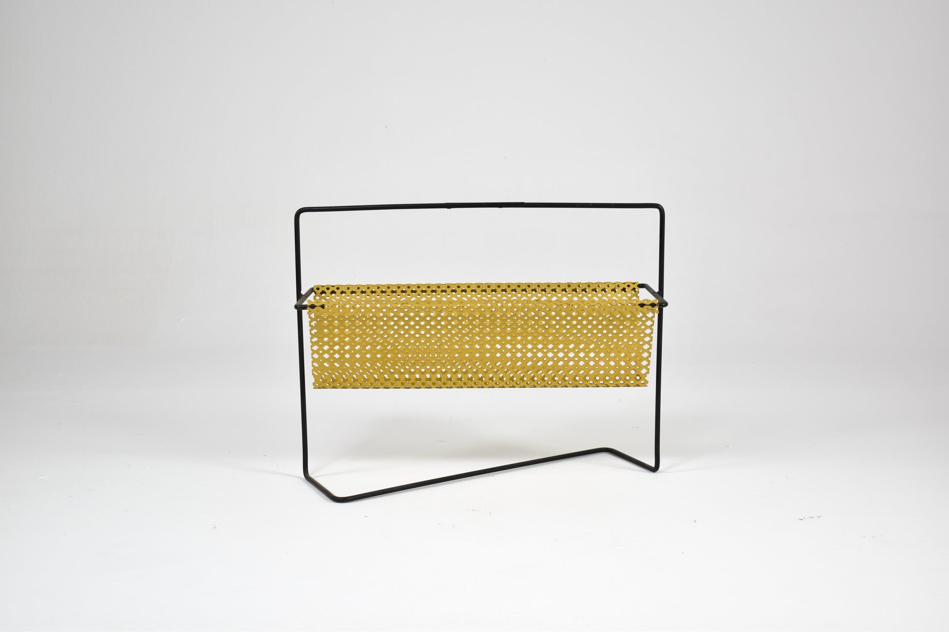 Shop 1950s–60s French Mid-Century Modern Magazine Rack in Perforated Metal - Spirit Gallery Vintage Furniture