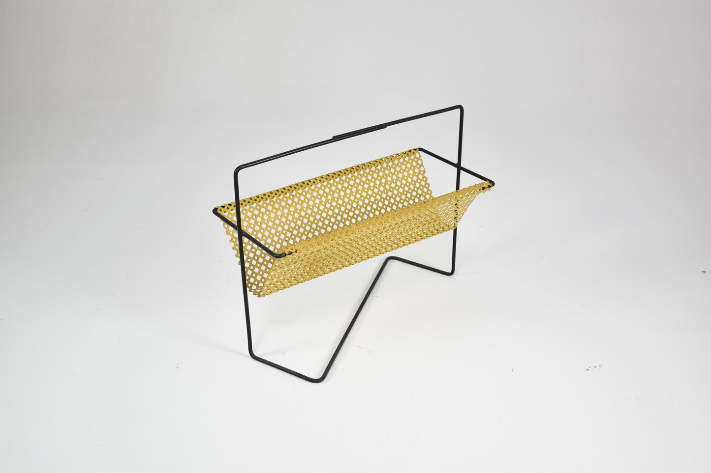 Shop 1950s–60s French Mid-Century Modern Magazine Rack in Perforated Metal - Spirit Gallery Vintage Furniture