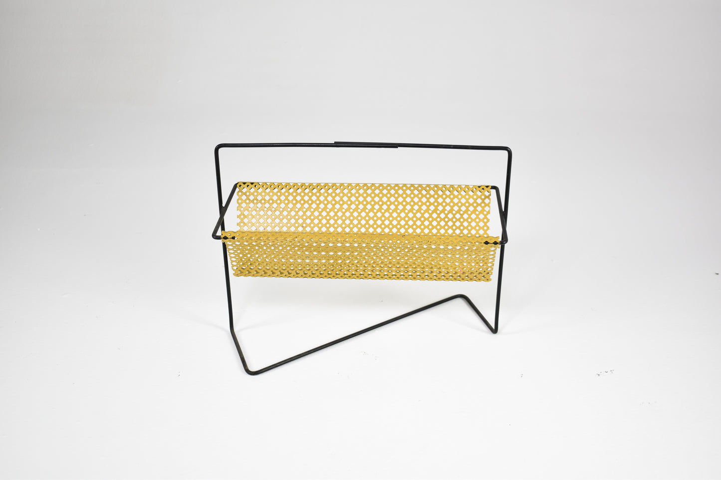 Shop 1950s–60s French Mid-Century Modern Magazine Rack in Perforated Metal - Spirit Gallery Vintage Furniture